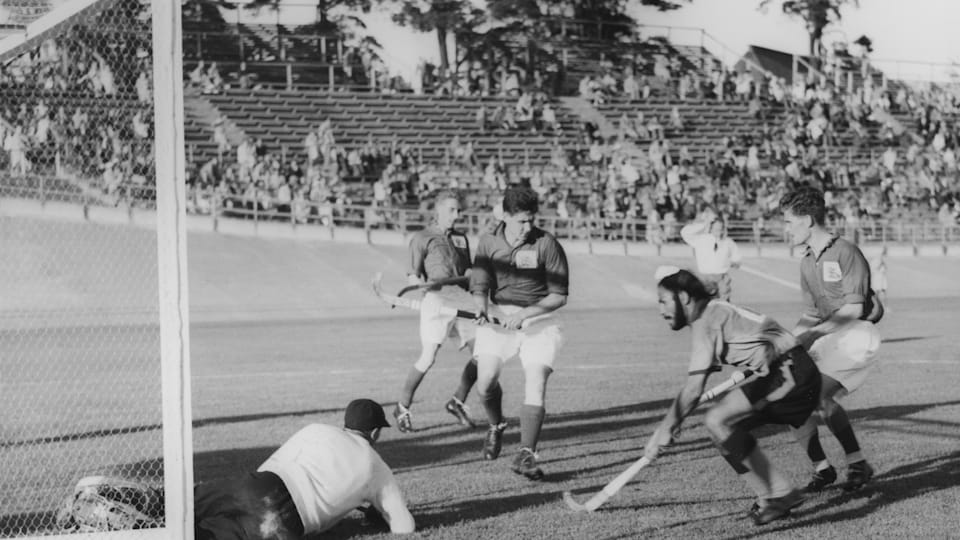 Balbir Singh in action for the Indian hockey team at the 1952 Olympics.