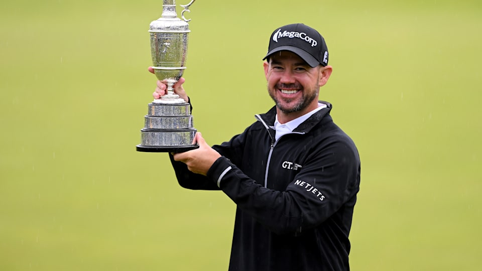 Harman holds up the Claret Jug trophy after winning the 2023 Open at Hoylake