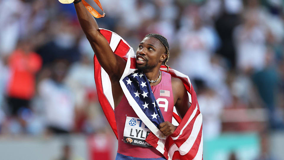 Noah Lyles celebrates winning the world 100m title in Budapest 