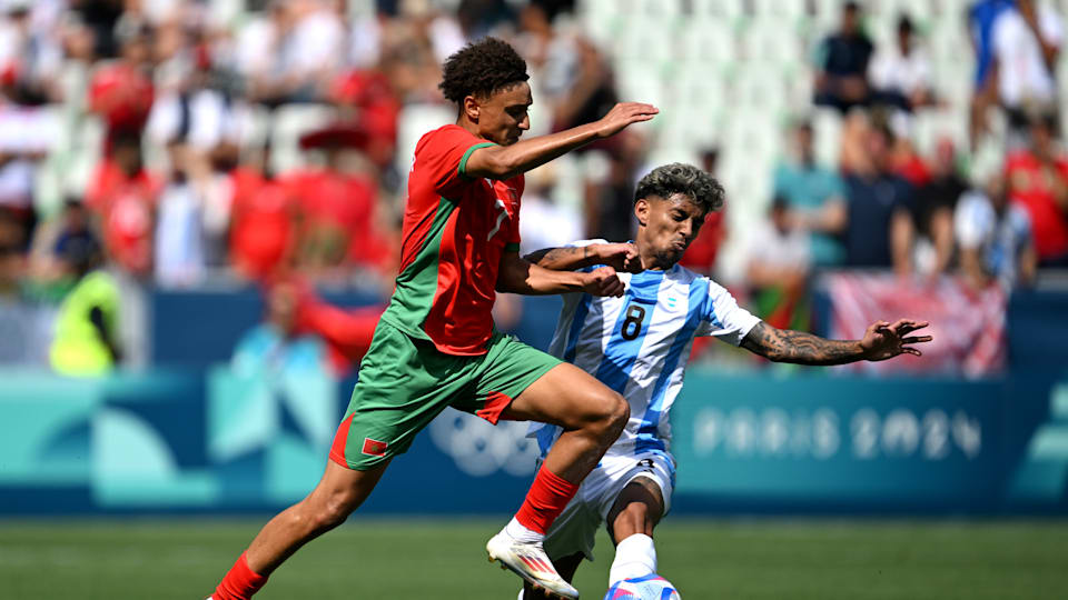 Eliesse Ben Seghir #7 of Team Morocco is challenged by Cristian Medina #8 of Team Argentina