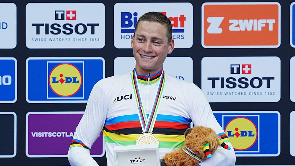 Mathieu van der Poel celebrates his road race title at the 2023 UCI Cycling World Championships
