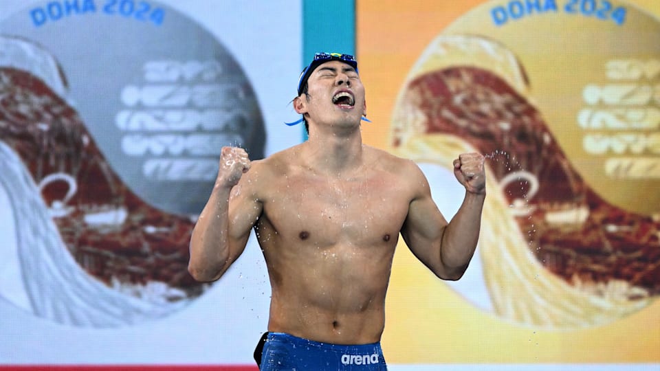Tomoru Honda of Team Japan celebrates after winning gold in the Men's 200m Butterfly Final on day thirteen of the Doha 2024 World Aquatics Championships