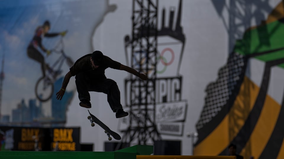 Silhouette of an athlete practicing on the Skateboarding Street Course in the Urban Park at the Huangpu Riverside. The Olympic Qualifier Series, Shanghai, China