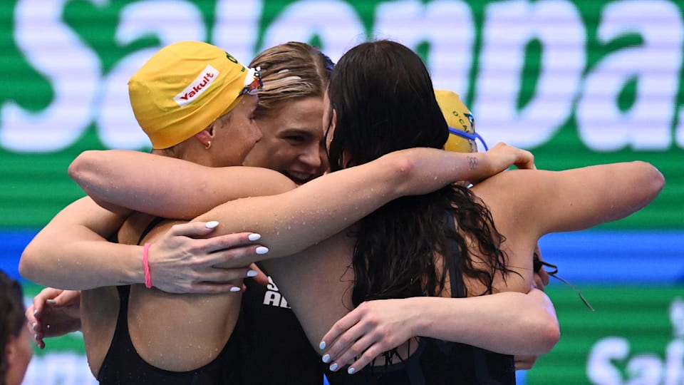 Australia react after their world record swim in the women's 4x100m freestyle relay at the 2023 World Championships