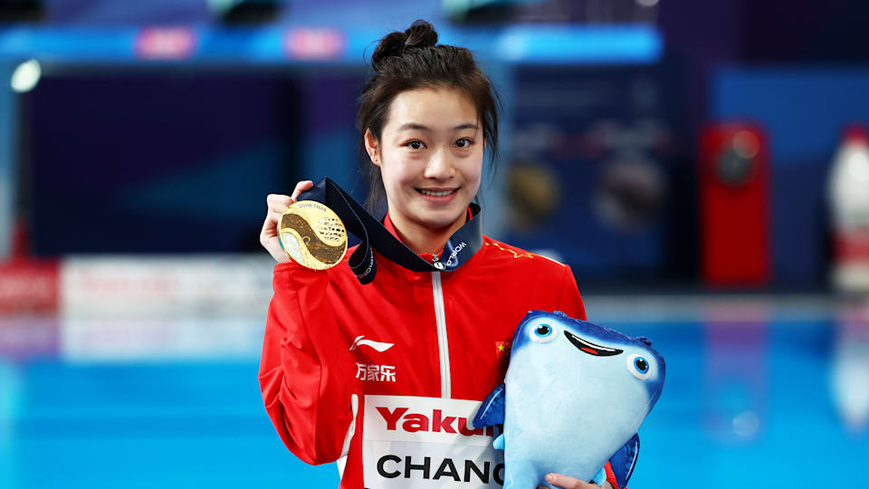 Chang Yani of People's Republic of China celebrates after winning the women's 3m springboard gold medal at the Doha 2023 World Aquatics Championships