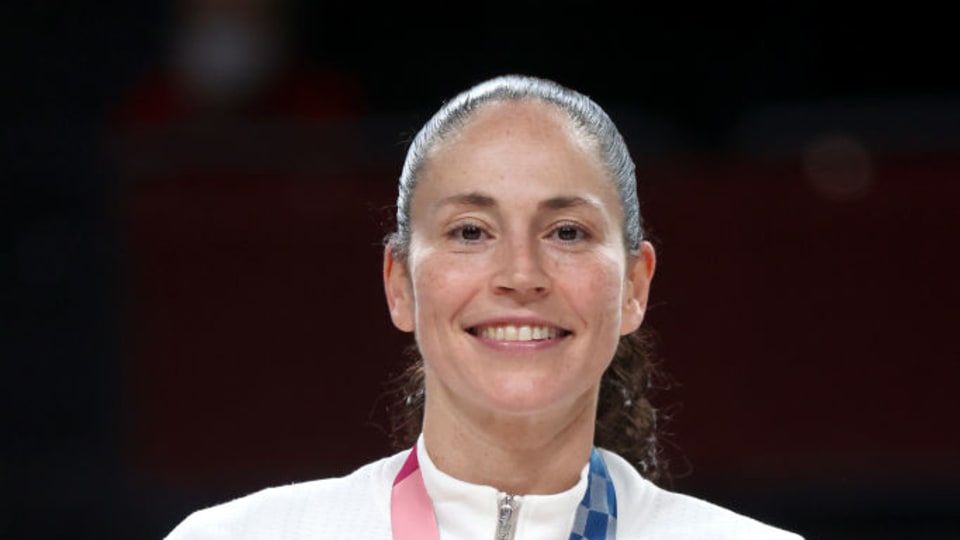 Sue Bird #6 of Team United States poses for photographs with her gold medal during the Women's Basketball medal ceremony on day sixteen of the 2020 Tokyo Olympic games at Saitama Super Arena on August 08, 2021 in Saitama, Japan. (Photo by Gregory Shamus/Getty Images)