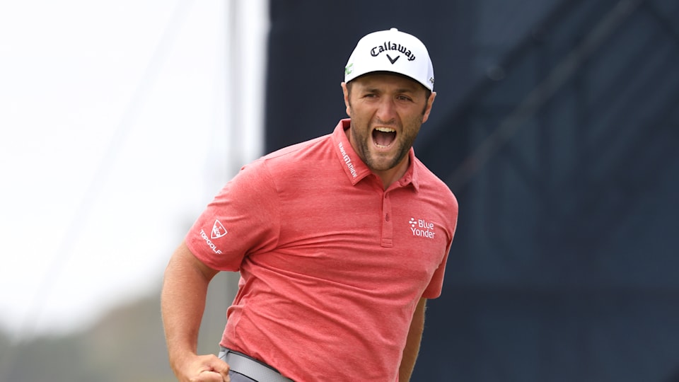 Jon Rahm celebrates putt