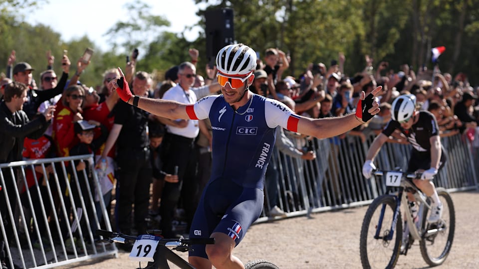 Victor Koretzky of France celebrates coming first in the Men's Cross-country Mountain Bike