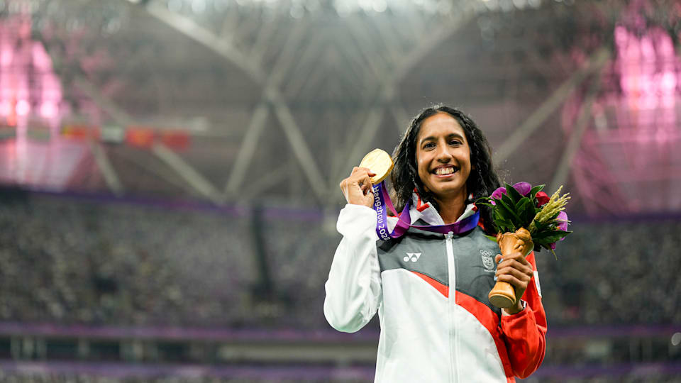 Singapore’s Pereira Veronica Shanti celebrating with her medal
