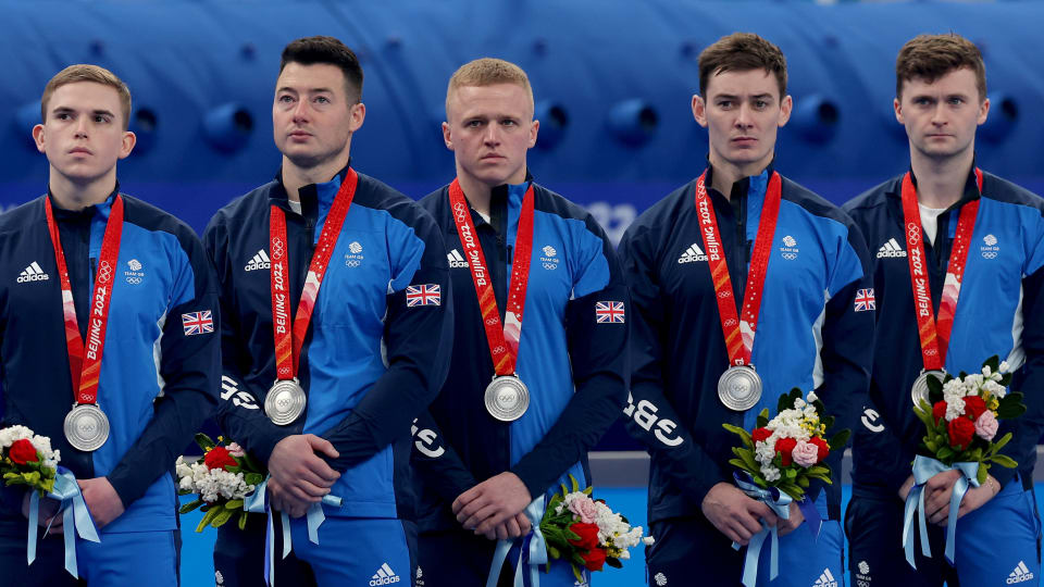 (L-R) Silver medallists Ross Whyte, Hammy McMillan, Bobby Lammie, Grant Hardie and Bruce Mouat receiving their silver medals at Beijing 2022