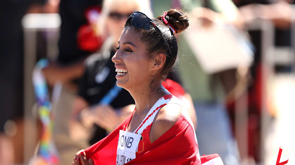 Kimberly Garcia Leon of Team Peru celebrates after winning gold in the Women's 20 Kilometres Race Walk Final on day one of the World Athletics Championships Oregon22