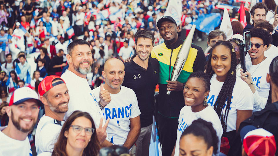 Usain Bolt and Tony Estanguet present Olympic and Paralympic Torch