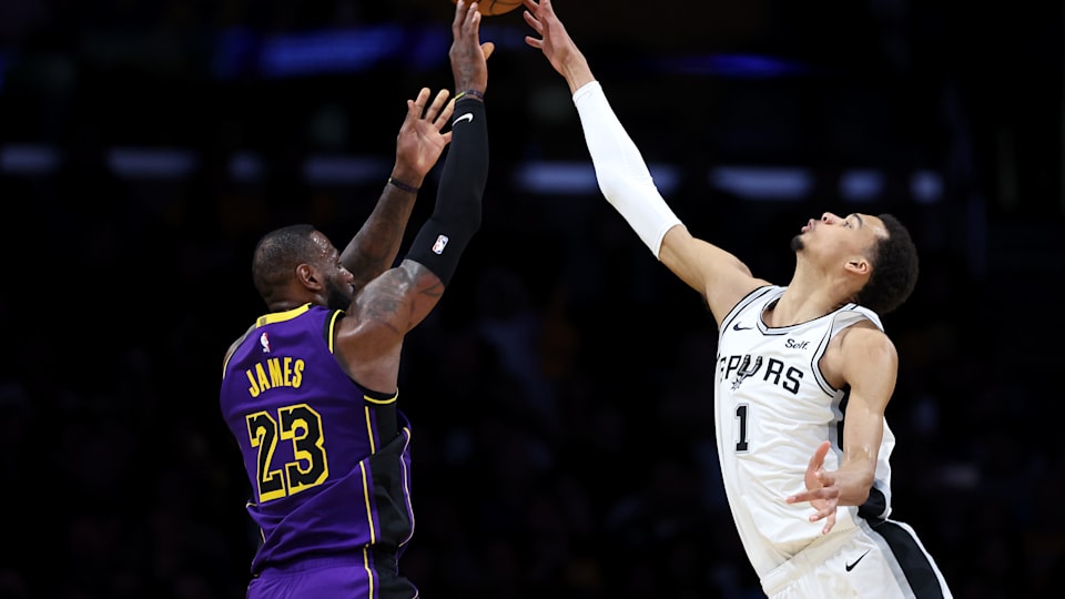 Victor Wembanyama #1 of the San Antonio Spurs blocks a shot by LeBron James #23