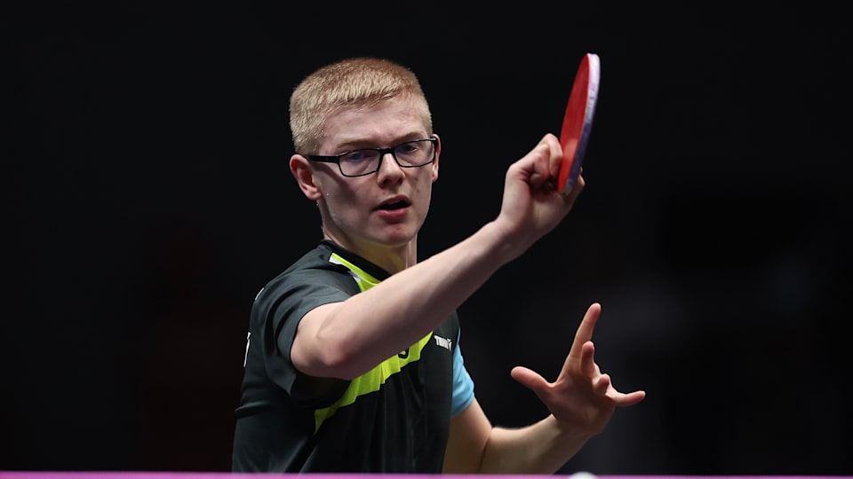 Felix Lebrun of France competes against Fan Zhendong of China in their Men's singles Round of 32 match on day two of WTT Champions Xinxiang 2023