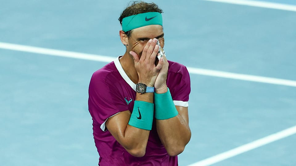 Rafa Nadal reacts after winning his 21st Grand Slam singles title at the 2022 Australian Open