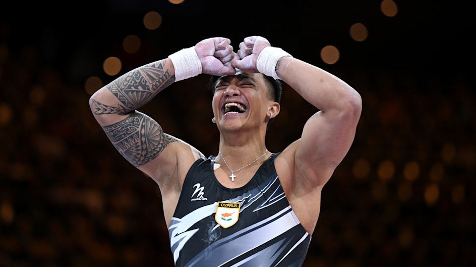 Marios Georgiou of Cyprus celebrates winning high bar title at 2022 European Championships