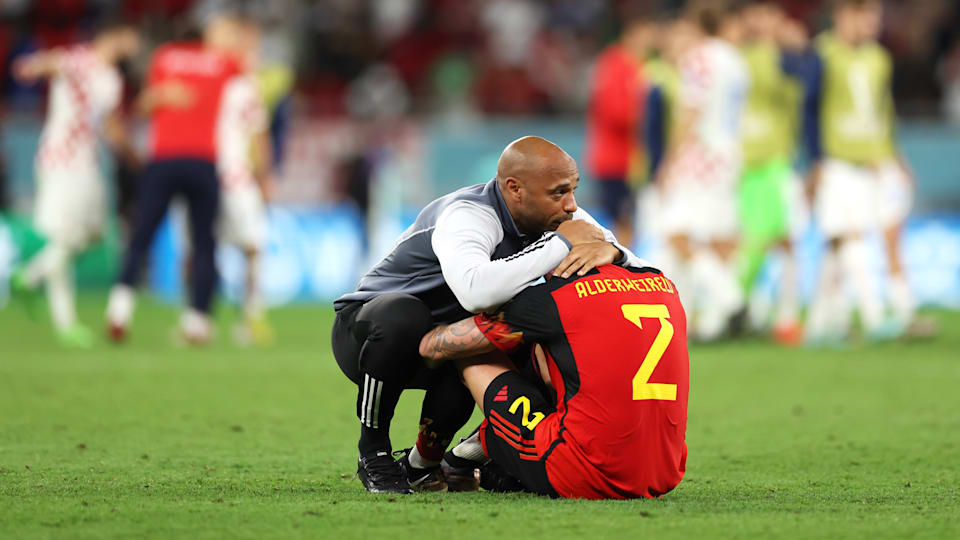 Toby Alderweireld of Belgium reacts with assistant coach Thierry Henry after the FIFA World Cup Qatar 2022.