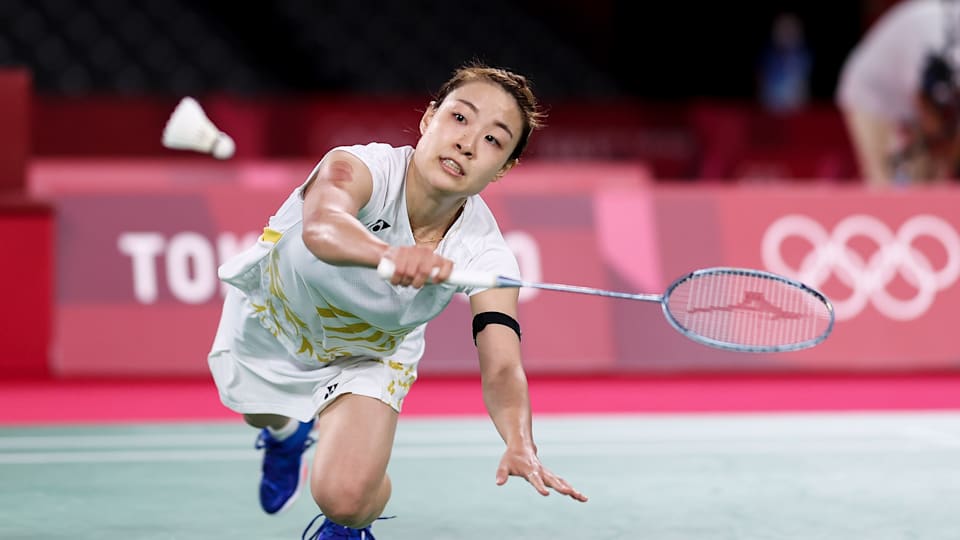 Nozomi Okuhara of Team Japan competes against He Bing Jiao of Team China during a Women's Singles Quarterfinal match on day seven of the Tokyo 2020 Olympic Games