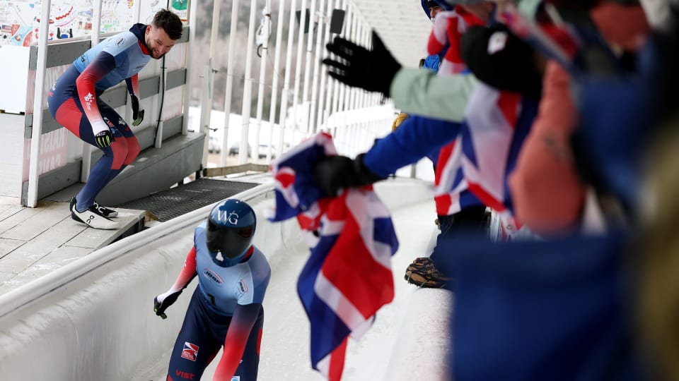 GB's Matt Weston celebrates 1-2 with teammate Marcus Wyatt at the men's skeleton IBSF World Championships 2025