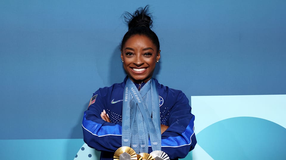 Simone Biles of Team United States poses with her Paris 2024 Olympic medals