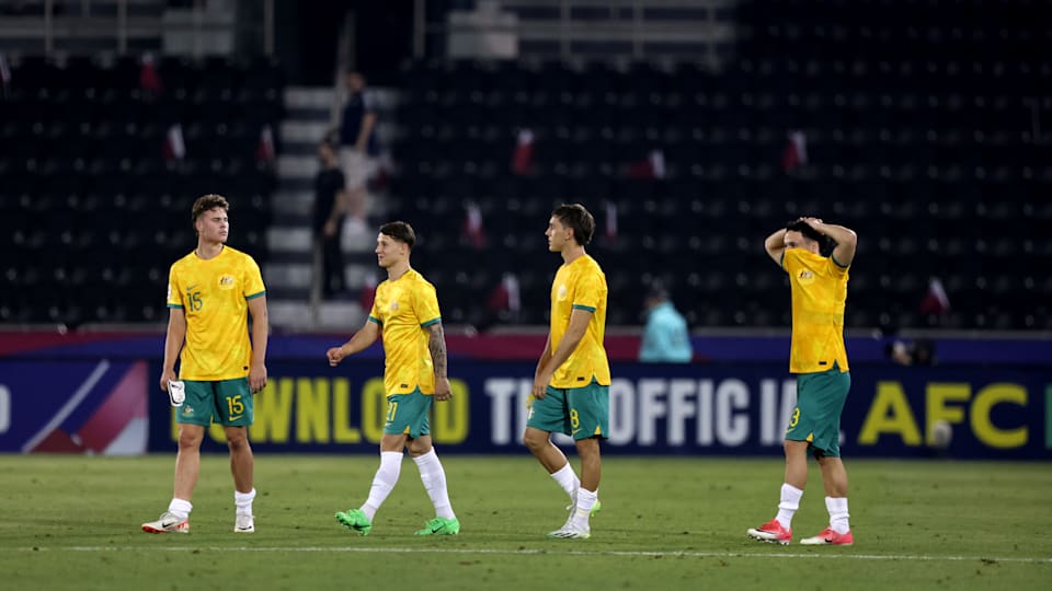 Australia players react after the AFC U23 Asian Cup match between Qatar and Australia.