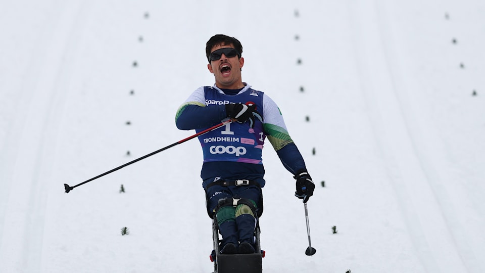 Cristian Ribera (BRA) celebrates, as he crosses the finish line during the Para Cross Country Men's Sprint Classic Final of the FIS Nordic World Ski Championships Trondheim at on March 05, 2025 in Trondheim, Norway. 