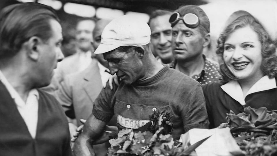 Italy's Gino Bartali winning the Tour de France for the second time