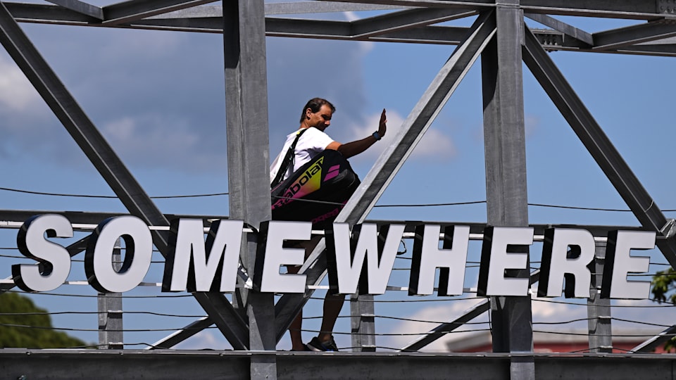 Rafael Nadal of Spain waves as he crosses a foot bridge on Day Five of the Internazionali BNL D'Italia 2024 at Foro Italico on May 10, 2024