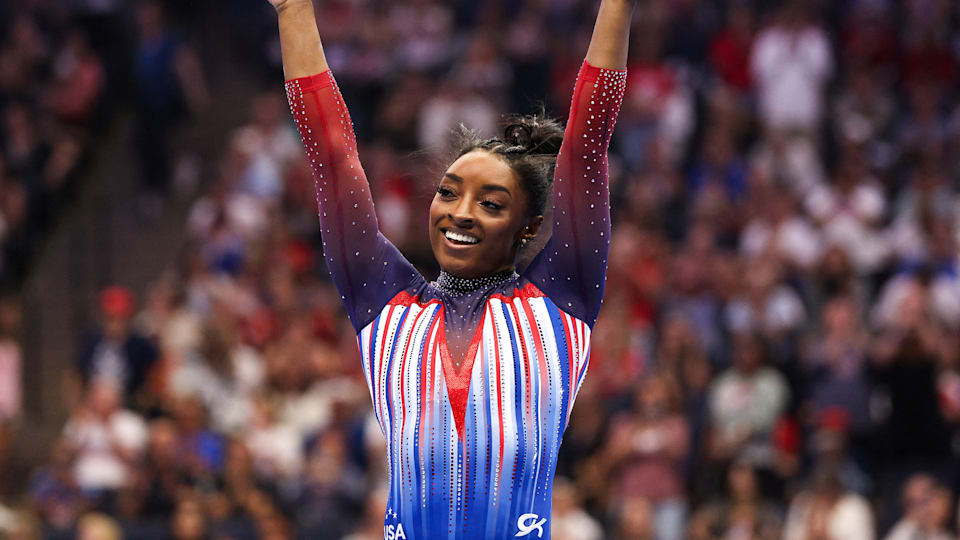 Simone Biles celebrates her floor routine