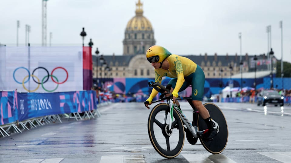 Road cycling: Australia's Grace Brown rides slippery road to Olympic gold  in Paris 2024 women's individual time trial