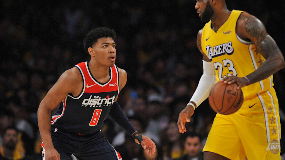 Washington Wizards forward Rui Hachimura (8) defends against Los Angeles Lakers forward LeBron James (23) during the first half at Staples Center. Mandatory Credit: Gary A. Vasquez-USA TODAY Sports