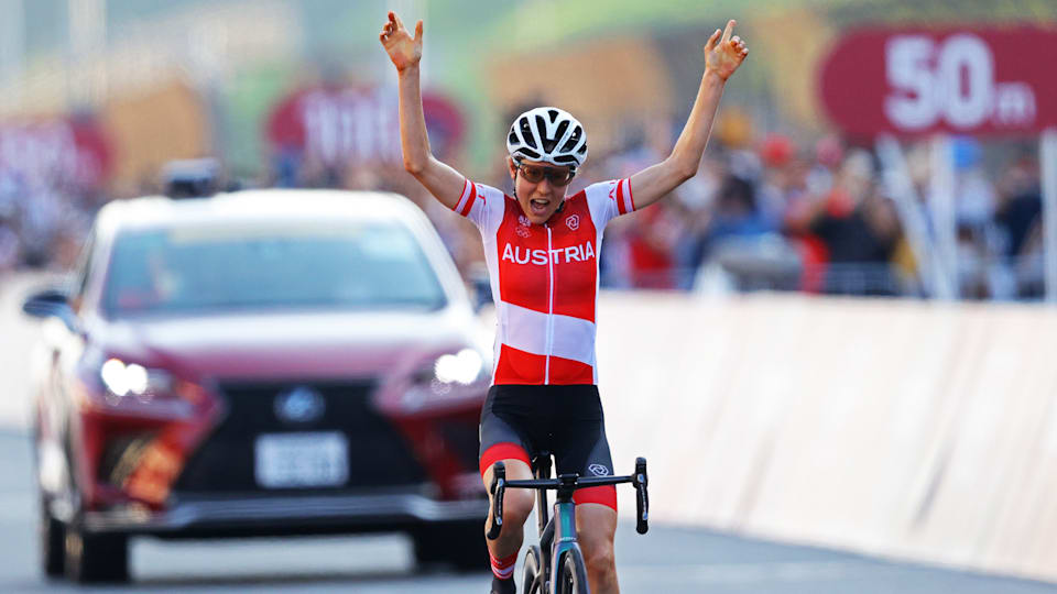 Anna Kiesenhofer of Team Austria celebrates winning the gold medal on day two of the Tokyo 2020 Olympic Games at Fuji International Speedway on July 25, 2021 in Oyama, Shizuoka, Japan.