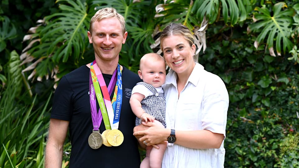 New Zealand Rower Hamish Bond poses for a photo with his son Finlay Bond and wife Lizzie Travis following his retirement announcement at the NZOC offices on January 27, 2022 in Auckland, New Zealand. (Photo by Hannah Peters/Getty Images for NZOC)
