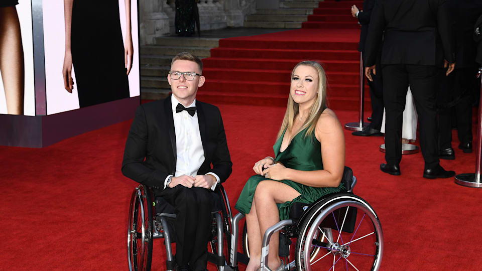 Para athletes Nathan Maguire and Hannah Cockroft attend the James Bond premiere for No Time to Die in London in 2021