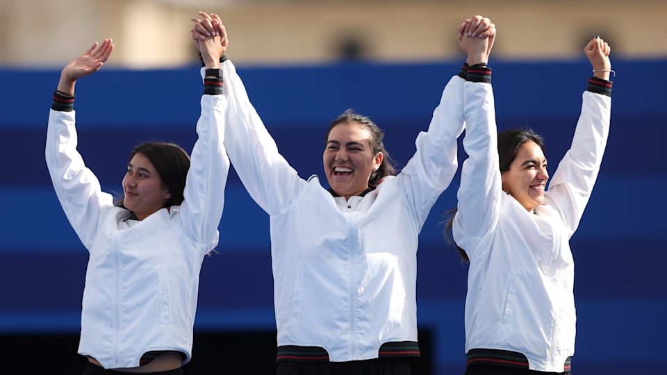 Bronze medalists Angela Ruiz, Alejandra Vanecia and Ana Vazquez of Team Mexico pose on the podium during the Archery medal ceremony after the Women's Team event on day two of the Olympic Games Paris 2024