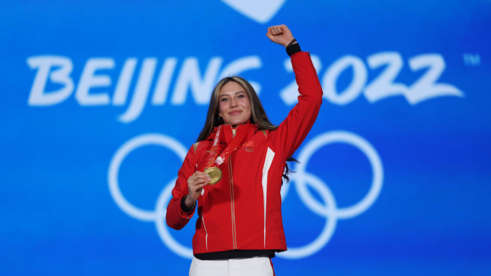 Gold medallist Ailing Eileen Gu of Team China celebrates with her medal 