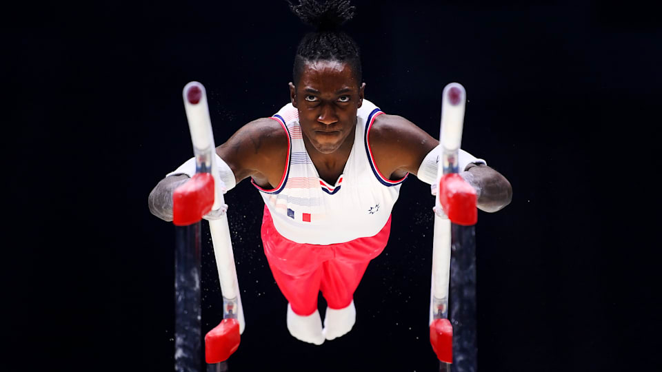 Cameron-Lie Bernard of Team France competes on Parallel Bars during Men's Qualifications on Day Three of the FIG Artistic Gymnastics World Championships at M&S Bank Arena on October 31, 2022 in Liverpool, England. (Photo by Laurence Griffiths/Getty Images)