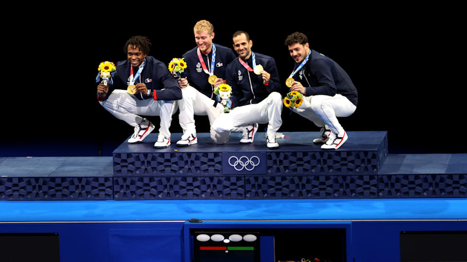 Gold medalists Team France celebrate on the podium during the medal ceremony for the Men's Foil Team Team Fencing on day nine of the Tokyo 2020 Olympic Games at Makuhari Messe Hall on August 01, 2021 in Chiba, Japan. (Photo by Harry How/Getty Images)