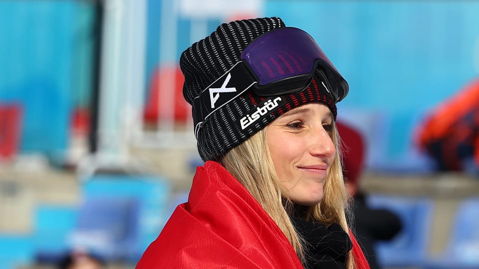 Gold medallist Anna Gasser of Team Austria poses after the Women's Snowboard Big Air flower ceremony on Day 11 of the Beijing Winter Olympics at Big Air Shougang on February 15, 2022