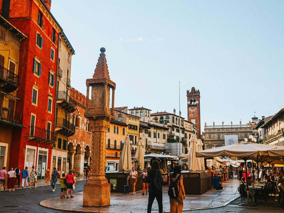 Image of Piazza delle Erbe in Verona, with people strolling