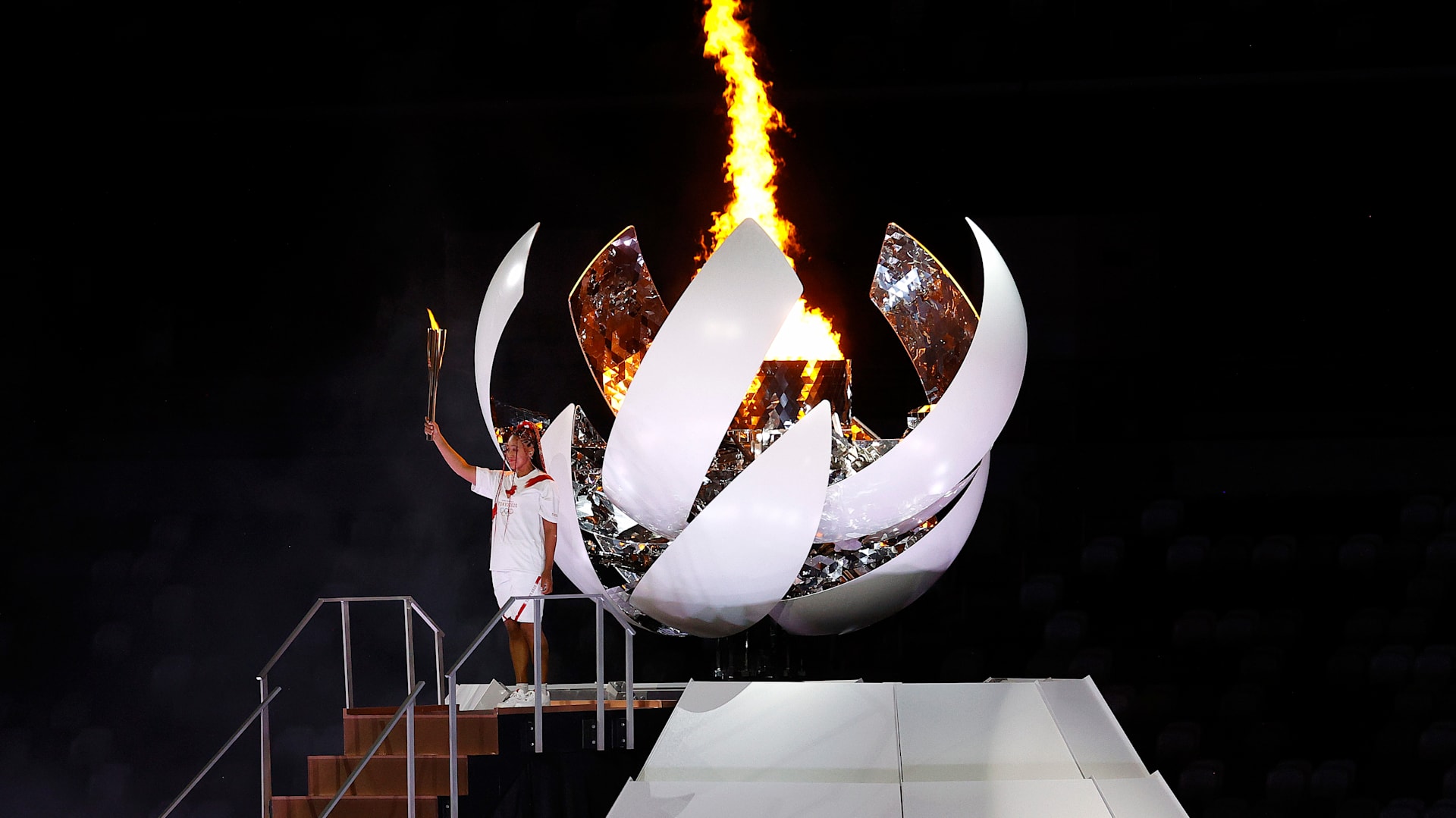 Hideki Matsui carries torch at Olympic Opening Ceremony