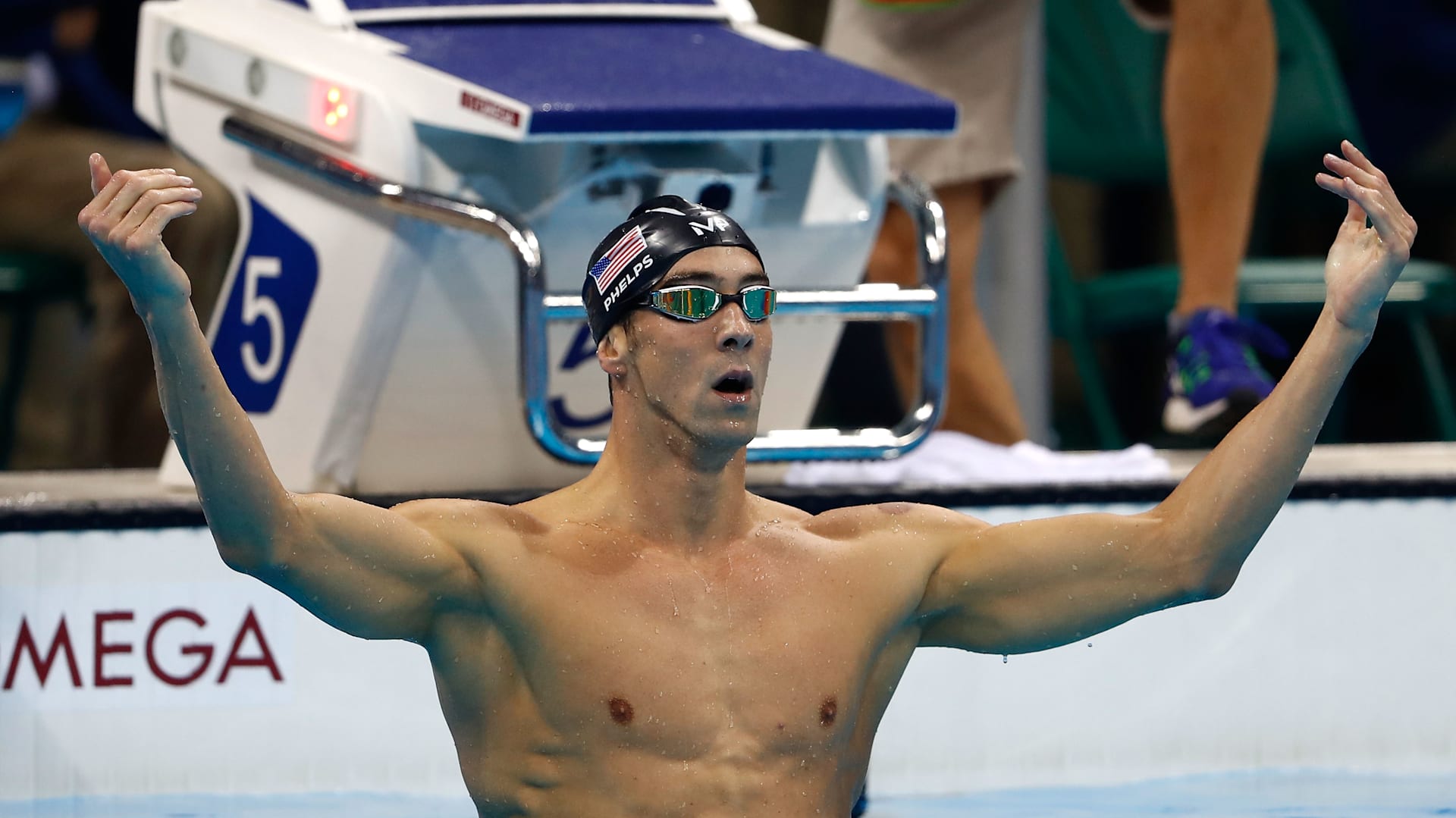 Swimming, Michael Phelps' training regimen, diet, gold medals and world  records