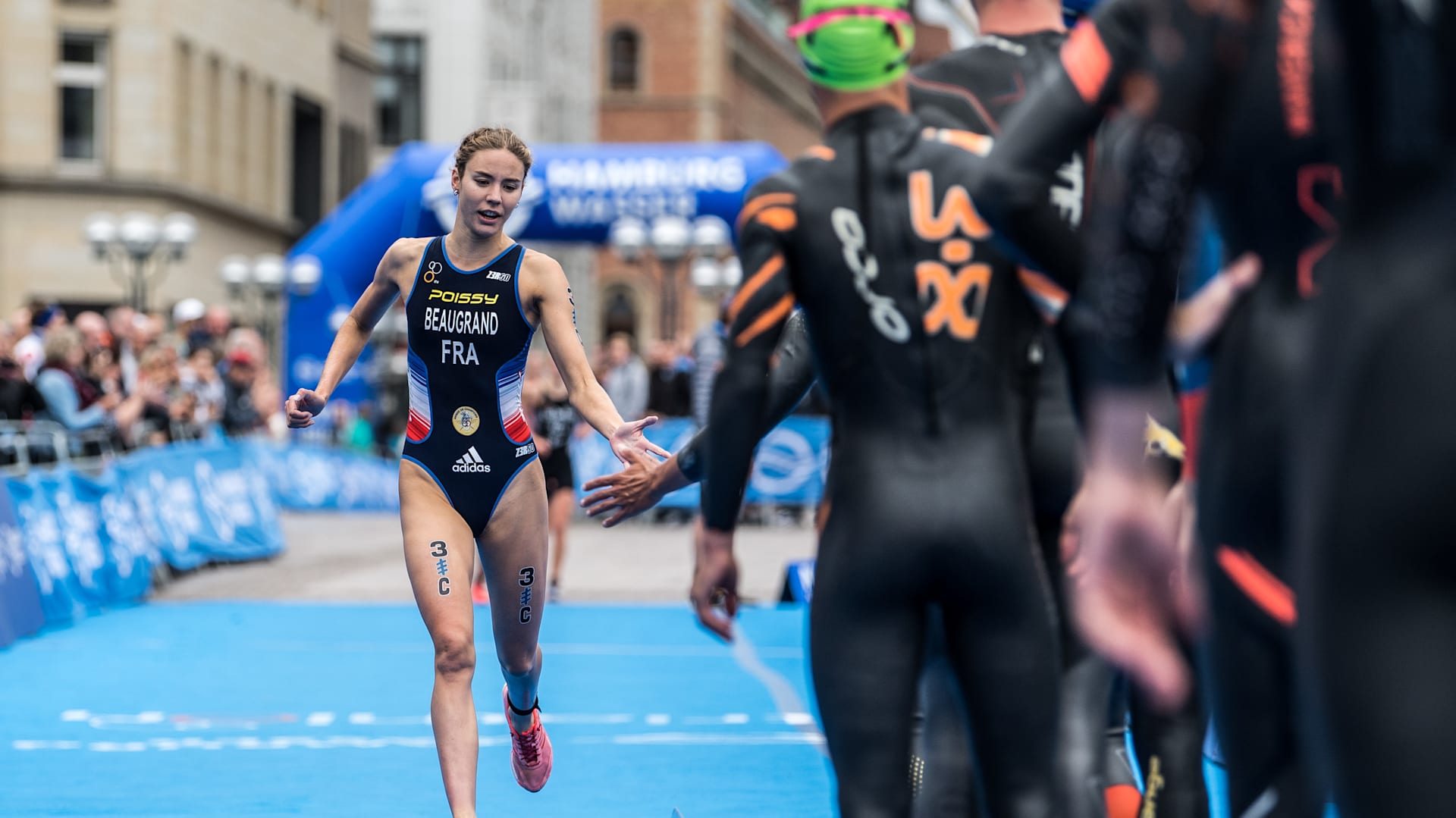 What is the new triathlon mixed relay