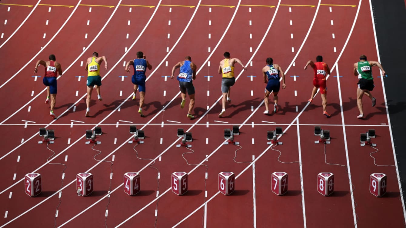 The winning Olympic 100-metre sprint times for men (blue points) and