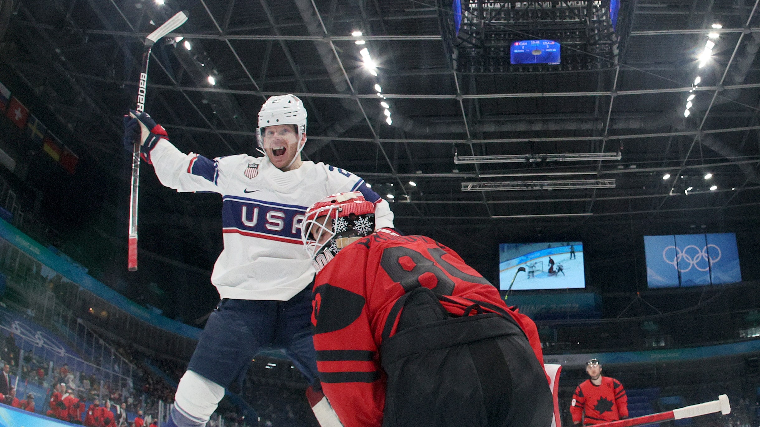 USA defeat Canada 4-2 in Group A of mens ice hockey group phase
