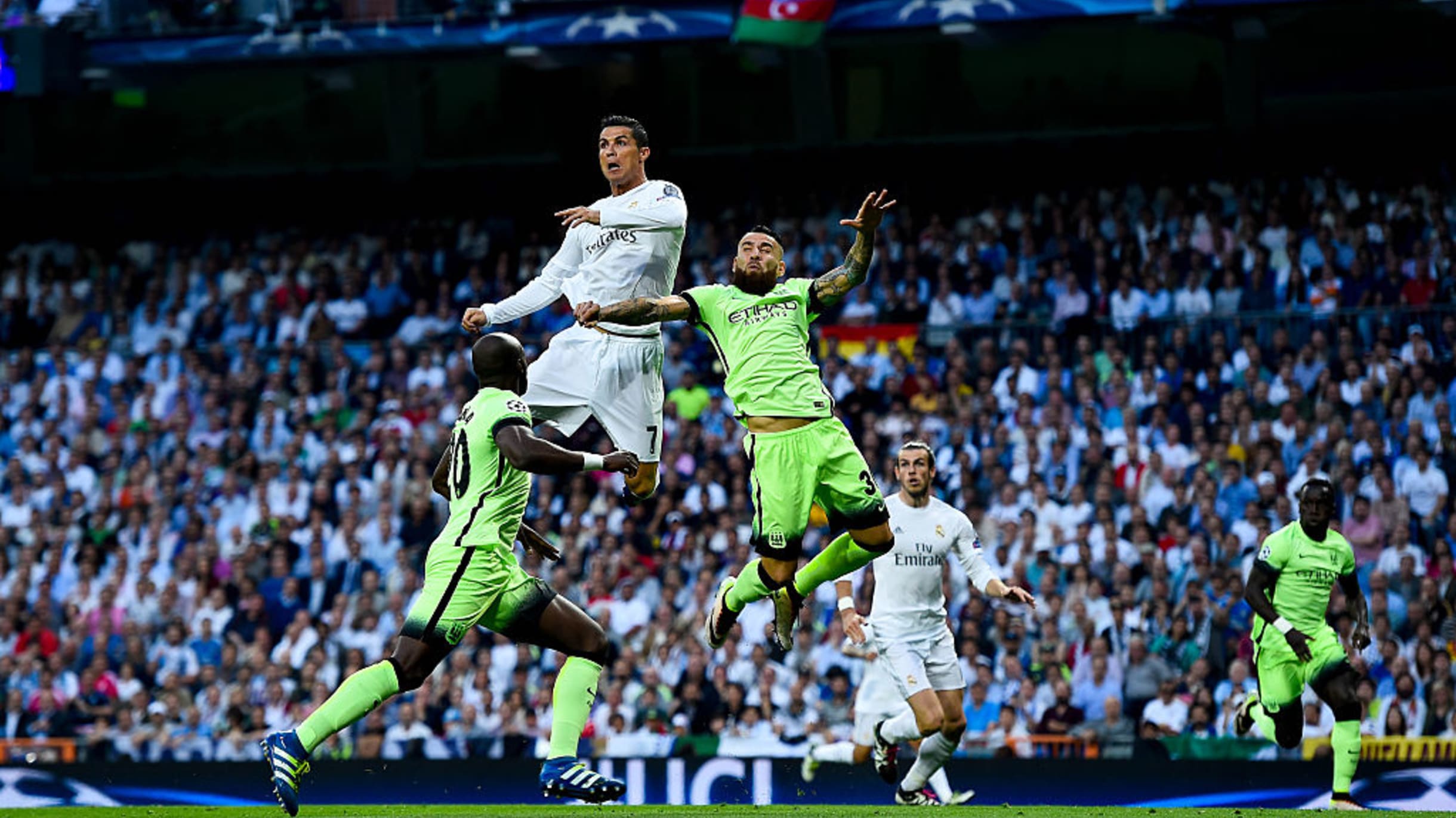 Portugal's Cristiano Ronaldo heads the ball during a team training