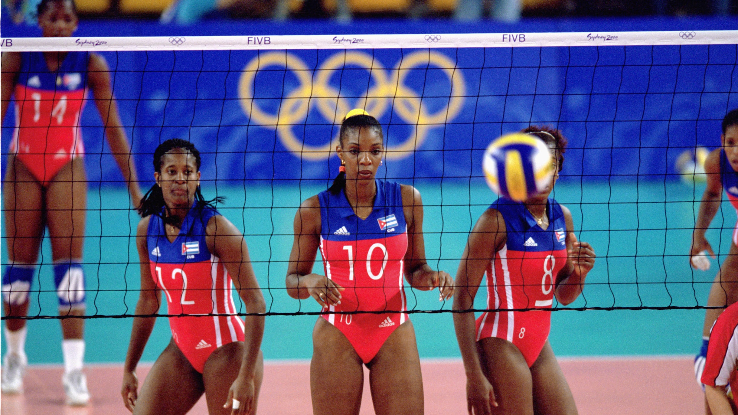 Why does one volleyball player have a different color jersey at the  Olympics?