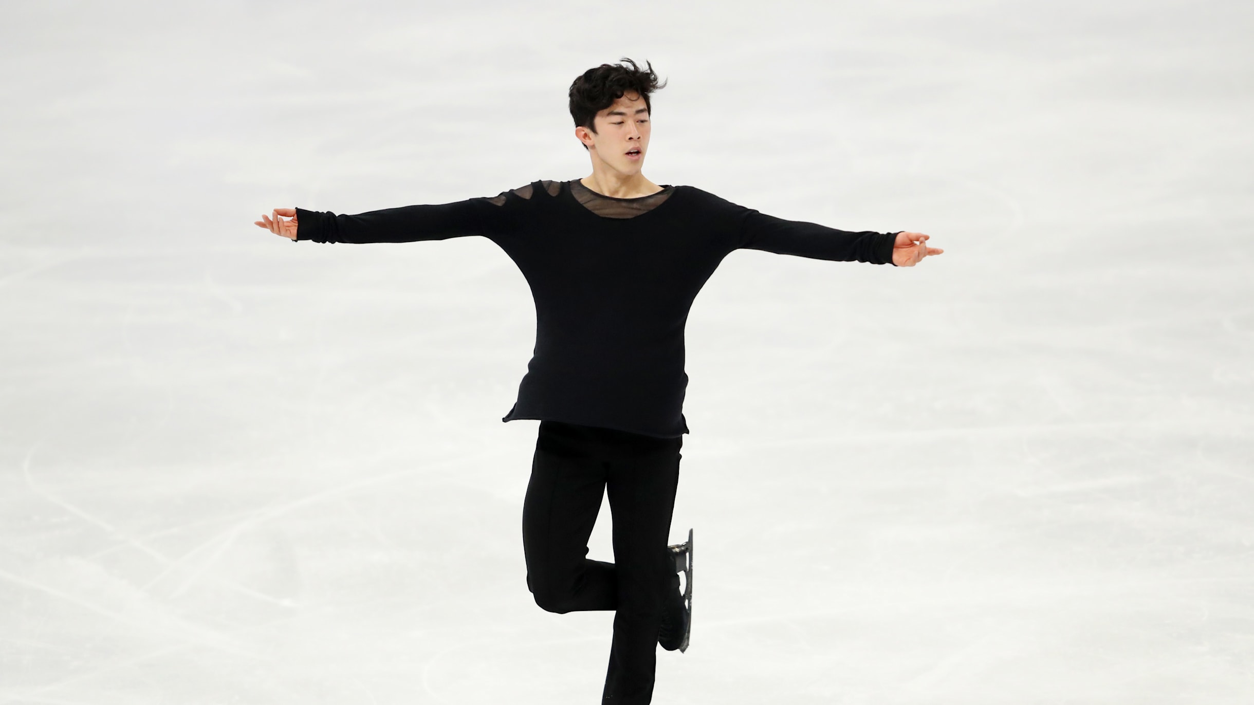 Nathan Chen wins third world figure skating title in a row