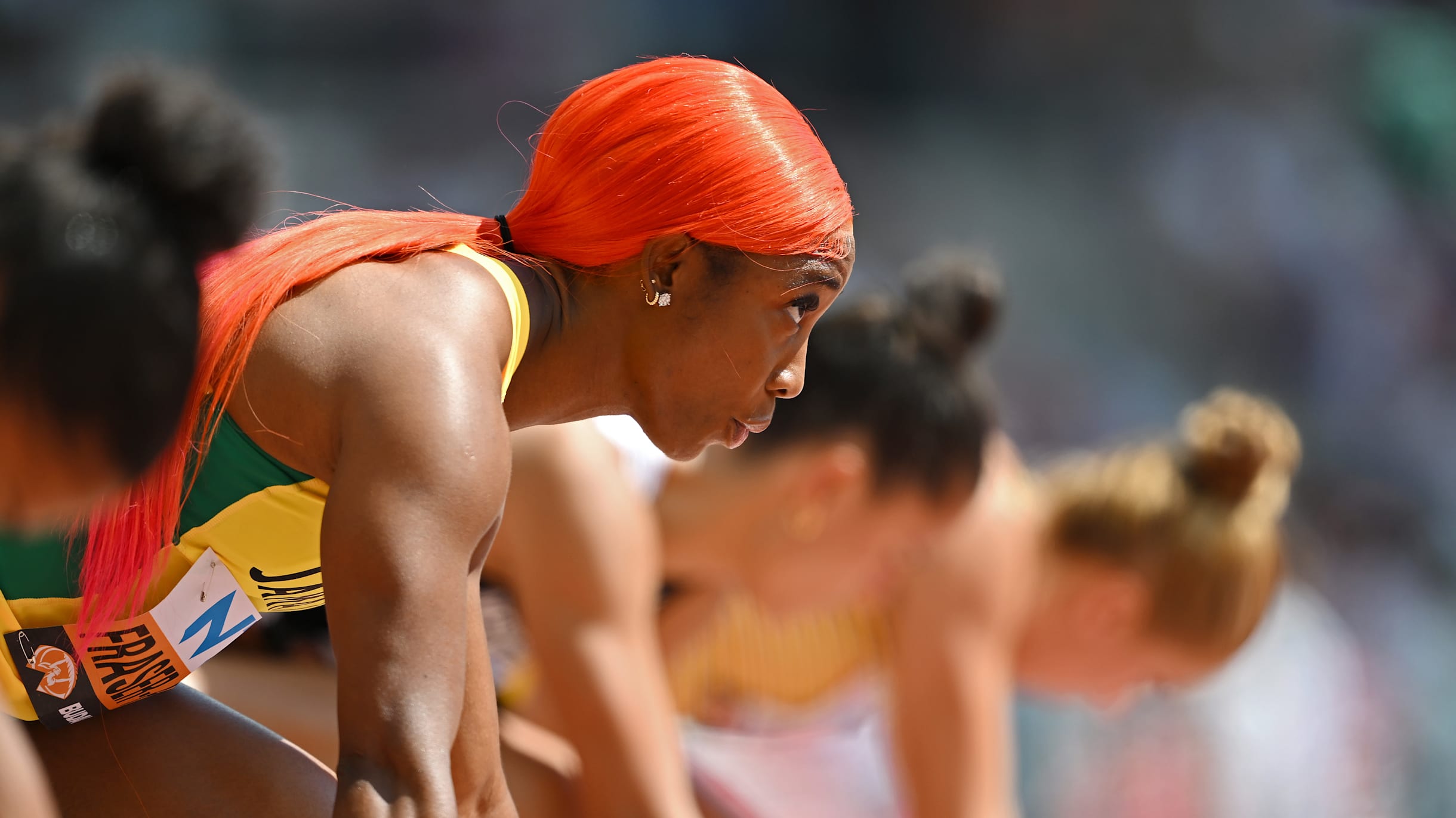 Shelly-Ann Fraser-Pryce shows-off her fiery orange hairand it's