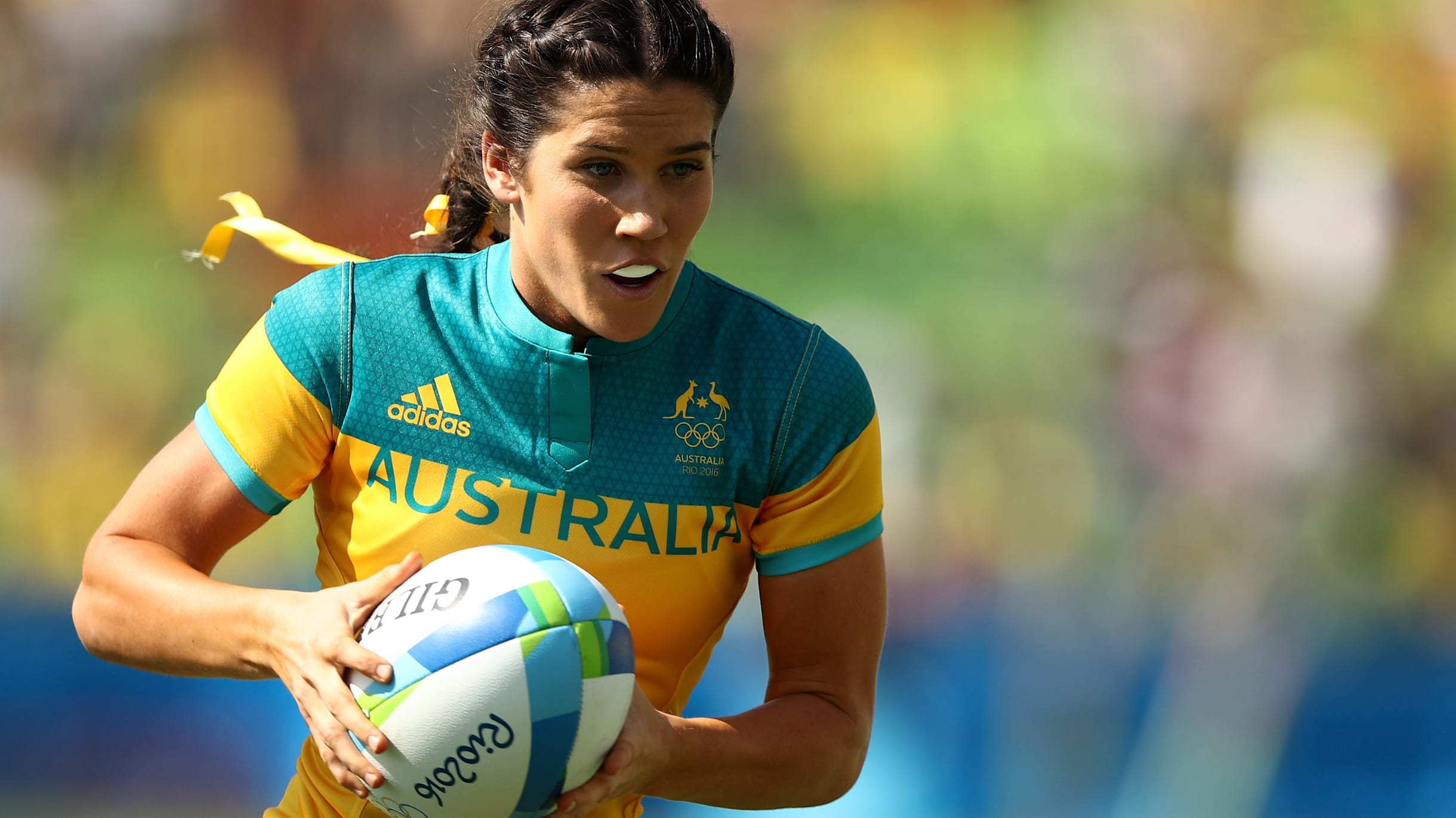 Rugby Sevens player Charlotte Caslick and her partner Lewis